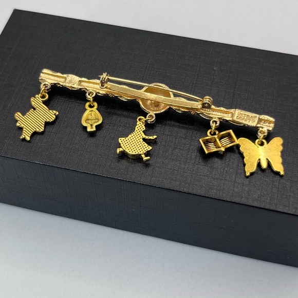 Alice in Wonderland Gold Brooch with Articulated Whimsical Charms - Picture 2 of 6